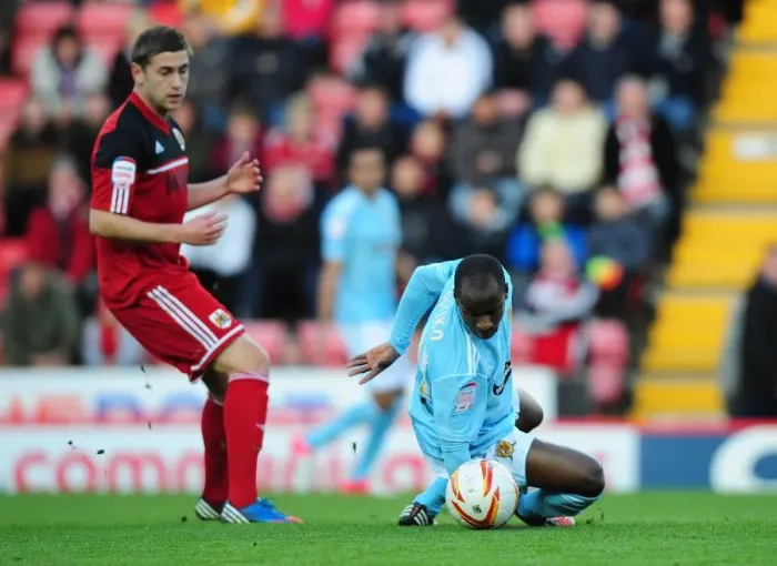 Framed Print : Battling for Championship Supremacy: Davies vs. Aluko
