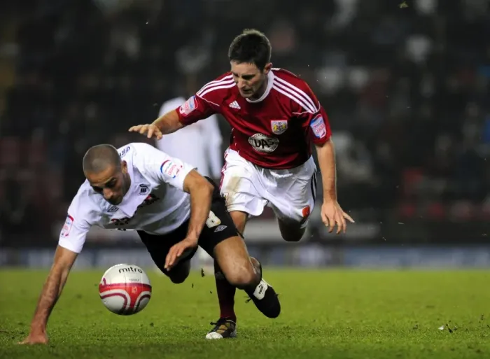 Framed Print : Battling for Championship Supremacy: Johnson vs. Pratley (2011) - A Football Rivalry at Ashton Gate