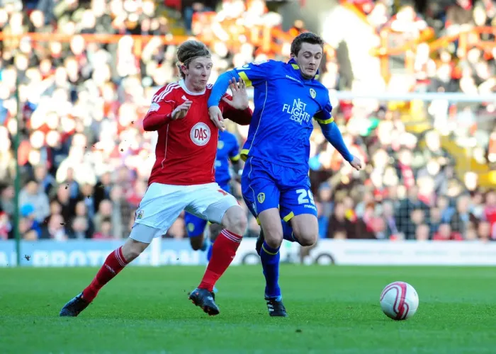 Framed Print : Battling for Control: Woolford vs McCartney in the Intense Championship Showdown between Bristol City and Leeds United at Ashton Gate Stadium (February 12, 2011) Framed Print : Battling for Control: Woolford vs McCartney in the Intense Championship Showdown between Bristol City and Leeds United at Ashton Gate Stadium (February 12, 2011)
