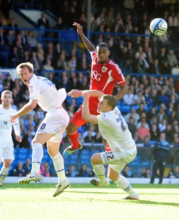 Framed Print : Battling for Control: Elliott vs. Becchio and Somma in the Intense 2011 League Cup Clash between Leeds United and Bristol City