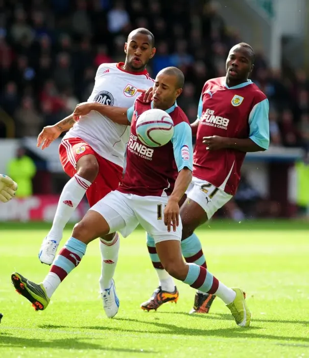 Framed Print : Battling for Control: Haynes vs. Mears in Burnley vs. Bristol City Championship Showdown, 2010