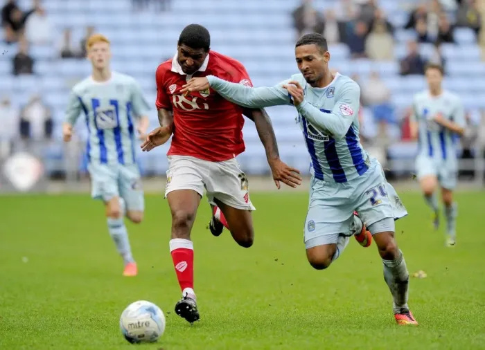 Framed Print : Battling for Control: Mark Little vs. Jordan Clarke in Sky Bet League One Clash