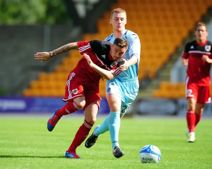 Framed Print : Battling for Control: Paul Anderson vs. Liam Caddis - Pre-Season Football Showdown