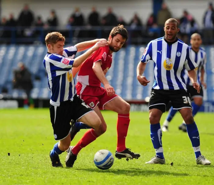 Framed Print : Battling for Control: Skuse vs. O'Connor in the Intense Championship Clash between Sheffield Wednesday and Bristol City (16th March 2010)
