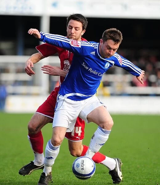 Battling for Control: Skuse vs. Frecklington in the Intense Championship Clash between Peterborough and Bristol City, 2010