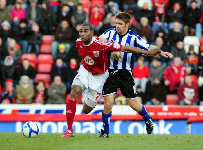 Framed Print : Battling for FA Cup Glory: Marvin Elliott vs. James O'Connor - Bristol City vs. Sheffield Wednesday (2011)
