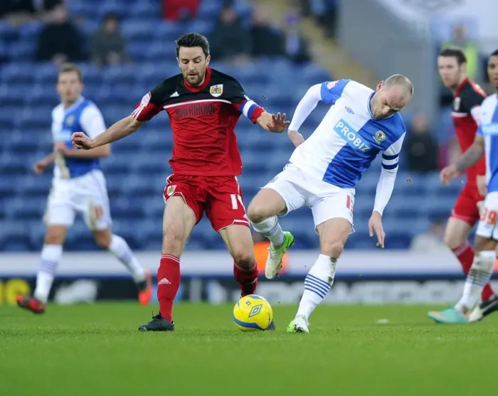 Framed Print : Battling for FA Cup Supremacy: Cole Skuse vs. Danny Murphy at Ewood Park