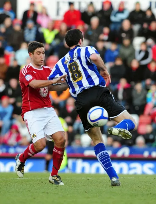 Framed Print : Battling for FA Cup Supremacy: Lee Johnson vs. Tommy Miller (Bristol City vs. Sheffield Wednesday, 08 / 01 / 2011) Framed Print : Battling for FA Cup Supremacy: Lee Johnson vs. Tommy Miller (Bristol City vs. Sheffield Wednesday, 08 / 01 / 2011)