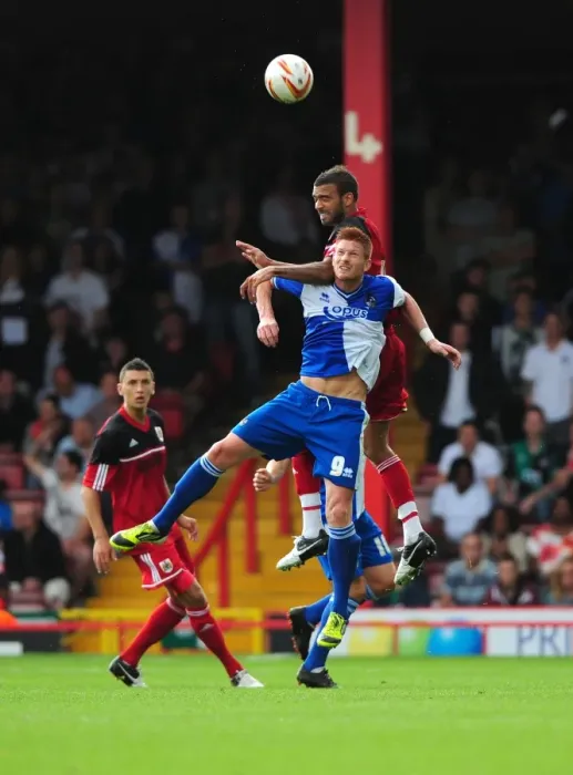 Framed Print : Battling for Height: Fontaine vs. Harold - A Football Rivalry Unfolds at Ashton Gate, 2012