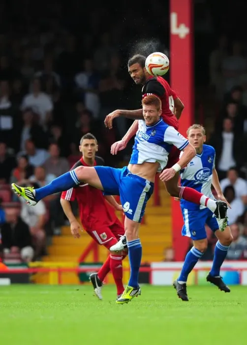 Framed Print : Battling for Height: A Football Rivalry - Liam Fontaine vs. Matt Harold at the Louis Carey Testimonial (August 4, 2012)