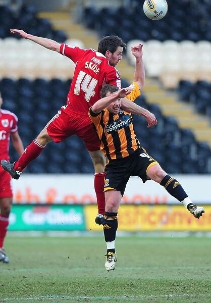 Battling for the High Ball: Cole Skuse vs. Paul McKenna - Hull City vs. Bristol City Championship Clash, 11 / 02 / 2012