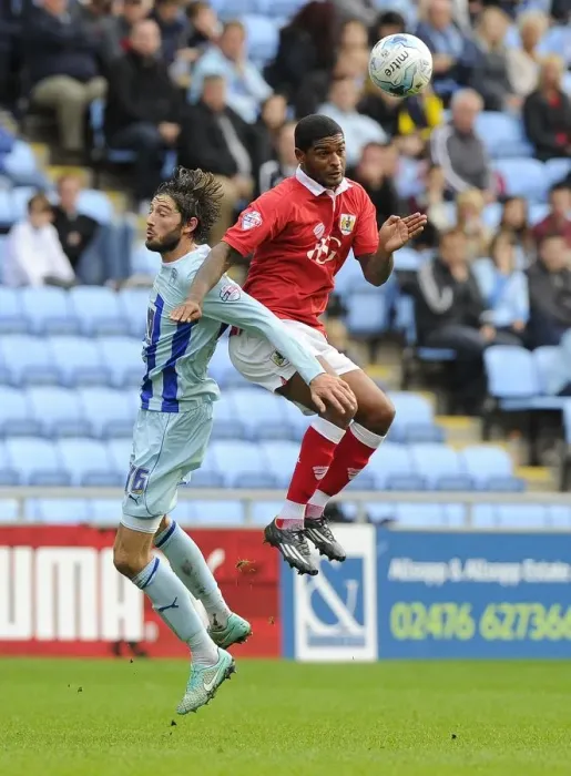 Framed Print : Battling for the High Ball: Mark Little vs. Adam Barton - Sky Bet League One Clash at Ricoh Arena Framed Print : Battling for the High Ball: Mark Little vs. Adam Barton - Sky Bet League One Clash at Ricoh Arena