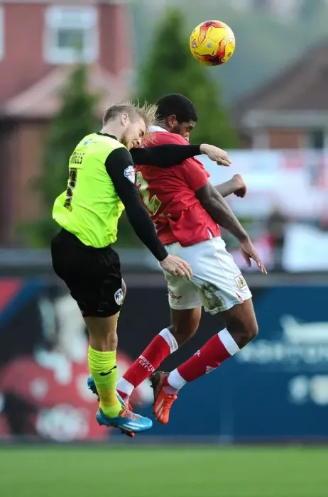 Framed Print : Battling for the High Ball: Mark Little vs. James Dayton - Sky Bet League One Clash Framed Print : Battling for the High Ball: Mark Little vs. James Dayton - Sky Bet League One Clash