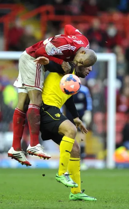 Framed Print : Battling for the High Ball: Marvin Elliott vs. Troy Deeney in the FA Cup Third Round - Bristol City vs. Watford Framed Print : Battling for the High Ball: Marvin Elliott vs. Troy Deeney in the FA Cup Third Round - Bristol City vs. Watford
