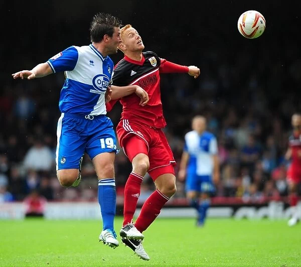 Battling for the High Ball: Ryan Taylor vs. Adam Virgo - Bristol City vs. Bristol Rovers, 2012 (Louis Carey Testimonial)