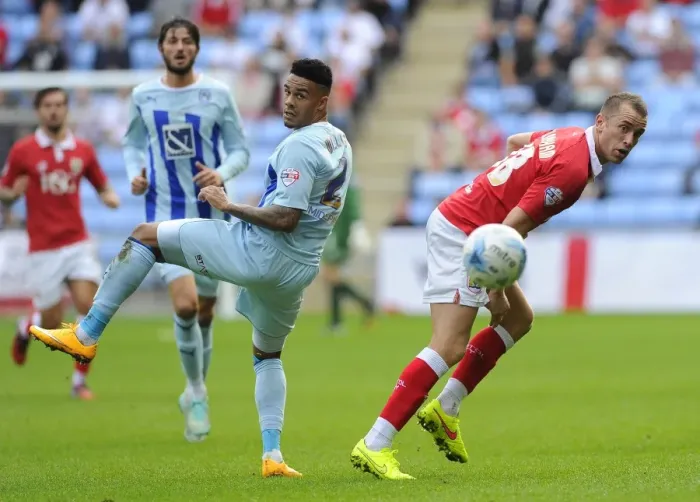 Framed Print : Battling for the High Ball: Wilbraham vs. Willis in Sky Bet League One Clash