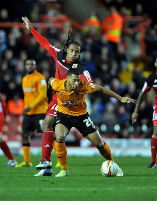 Framed Print : Battling Midfielders: Neil Danns of Bristol City and David Davis of Wolverhampton Wanderers Clash for the Ball in Championship Match Framed Print : Battling Midfielders: Neil Danns of Bristol City and David Davis of Wolverhampton Wanderers Clash for the Ball in Championship Match