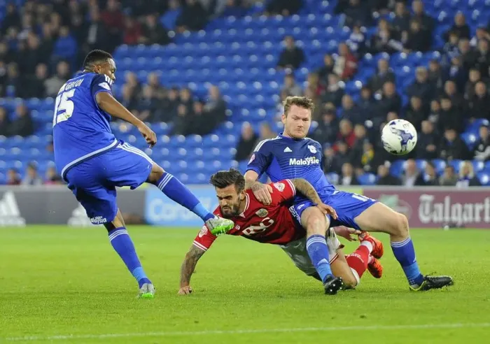 Framed Print : Battling Midfielders: Gunnarsson vs. Pack in Cardiff City vs. Bristol City Championship Clash Framed Print : Battling Midfielders: Gunnarsson vs. Pack in Cardiff City vs. Bristol City Championship Clash