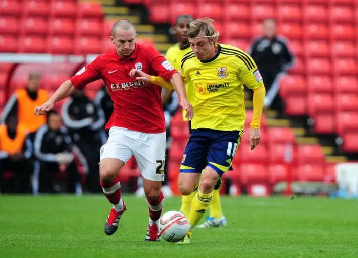 Framed Print : Battling Midfielders: Woolford vs Drinkwater in Barnsley vs Bristol City Championship Clash, 2011 Framed Print : Battling Midfielders: Woolford vs Drinkwater in Barnsley vs Bristol City Championship Clash, 2011