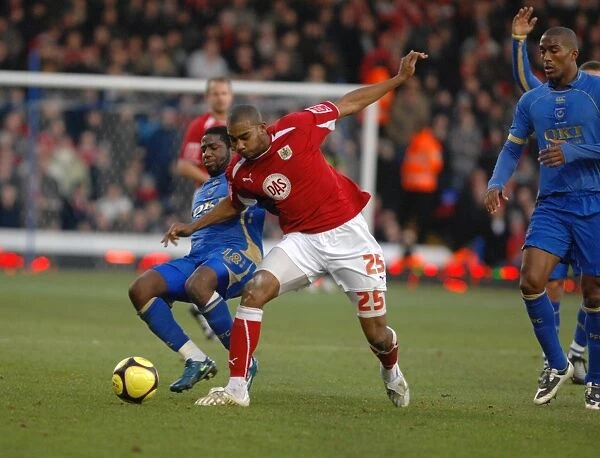 Battling Moment: Marvin Elliott vs. Arnold Mvuemba - FA Cup Clash between Portsmouth and Bristol City