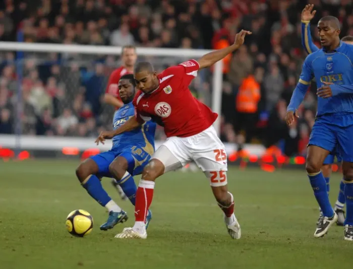Framed Print : Battling Moment: Marvin Elliott vs. Arnold Mvuemba - FA Cup Clash between Portsmouth and Bristol City Framed Print : Battling Moment: Marvin Elliott vs. Arnold Mvuemba - FA Cup Clash between Portsmouth and Bristol City