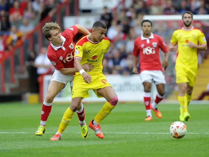 Framed Print : Battling Rivals: Luke Freeman vs. Dele Alli - Intense Clash at Ashton Gate