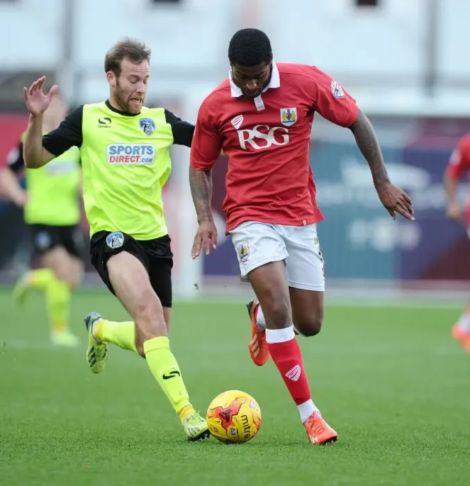 Framed Print : Battling Rivals: Mark Little vs. James Dayton - Intense Moment in the Bristol City vs. Oldham Athletic Rivalry