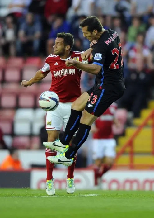 Framed Print : Battling Rivals: Sam Baldock vs. Florian Marange - Football Showdown at Ashton Gate