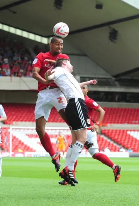Framed Print : Battling for Supremacy: Dexter Blackstock vs Mark Wilson in Nottingham Forest vs Bristol City Championship Clash