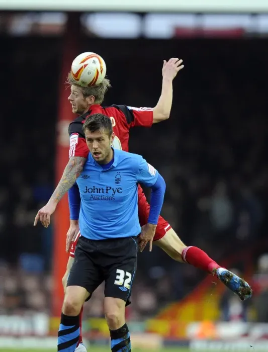 Framed Print : Battling for Supremacy: Jon Stead vs Elliott Ward in the Npower Championship Clash between Bristol City and Nottingham Forest Framed Print : Battling for Supremacy: Jon Stead vs Elliott Ward in the Npower Championship Clash between Bristol City and Nottingham Forest