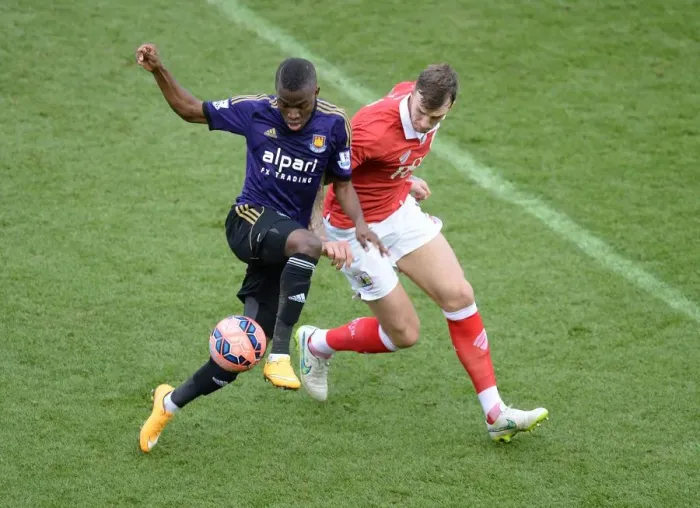 Framed Print : Battling for Supremacy: Aden Flint vs. Enner Valencia in the FA Cup Fourth Round Clash between Bristol City and West Ham United Framed Print : Battling for Supremacy: Aden Flint vs. Enner Valencia in the FA Cup Fourth Round Clash between Bristol City and West Ham United