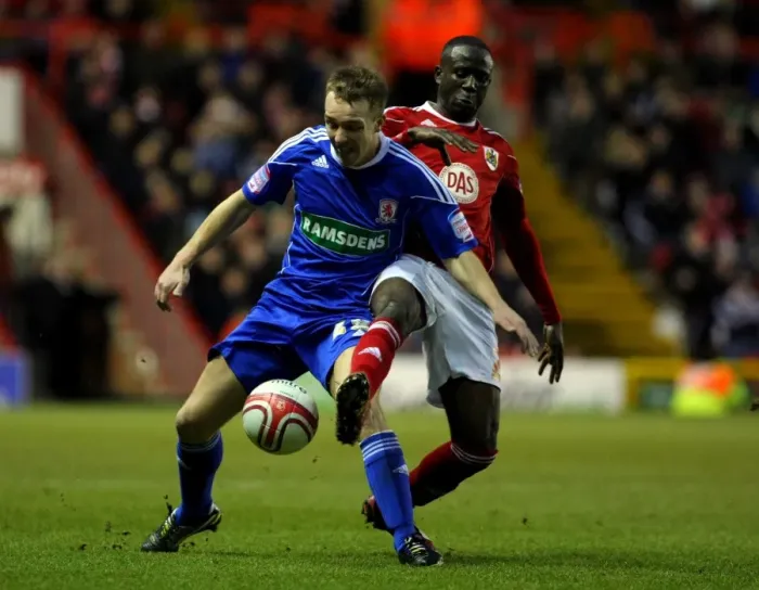 Framed Print : Battling for Supremacy: Adomah vs. Taylor in the Championship Clash between Bristol City and Middlesbrough Framed Print : Battling for Supremacy: Adomah vs. Taylor in the Championship Clash between Bristol City and Middlesbrough