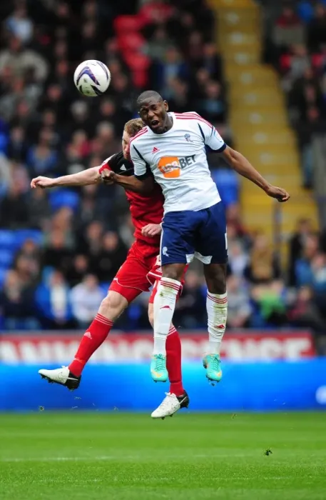 Framed Print : Battling for Supremacy: Afobe vs. Pearson in the 2010-11 Championship Clash between Bolton Wanderers and Bristol City