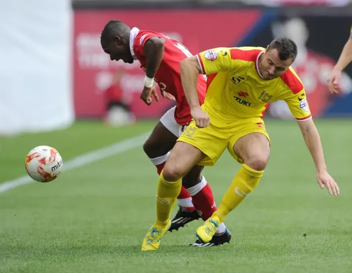 Framed Print : Battling for Supremacy: Agard vs. Kay in the Heat of Bristol City vs. MK Dons Rivalry Framed Print : Battling for Supremacy: Agard vs. Kay in the Heat of Bristol City vs. MK Dons Rivalry