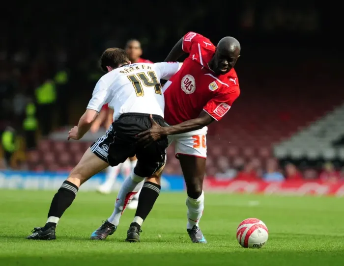 Framed Print : Battling for Supremacy: Agyemang vs Barker in the 2010 Championship Clash between Bristol City and Derby County Framed Print : Battling for Supremacy: Agyemang vs Barker in the 2010 Championship Clash between Bristol City and Derby County