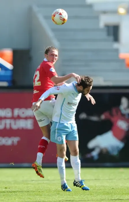 Framed Print : Battling for Supremacy: Ayling vs. Proschwitz in the Sky Bet League One Clash at Ashton Gate