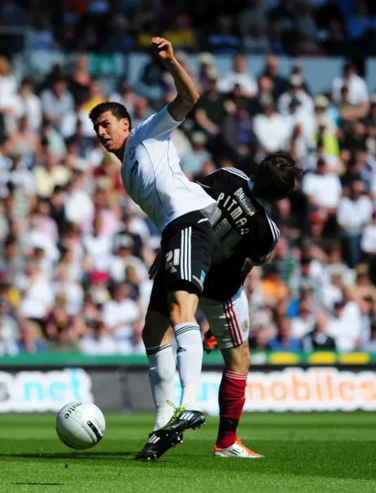 Framed Print : Battling for Supremacy: Brett Pitman vs. Daniel Ayala in the Derby County vs. Bristol City Championship Clash, April 2011