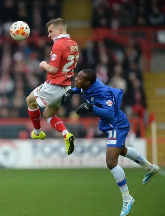 Framed Print : Battling for Supremacy: Bryan vs. Hoyte in the Sky Bet League One Clash between Bristol City and Gillingham Framed Print : Battling for Supremacy: Bryan vs. Hoyte in the Sky Bet League One Clash between Bristol City and Gillingham