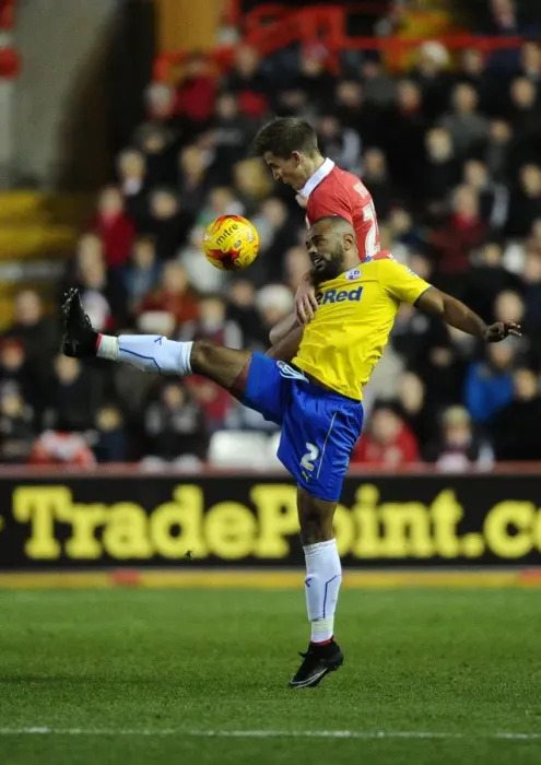 Framed Print : Battling for Supremacy: Bryans vs Oyebanjo in the Sky Bet League One Clash between Bristol City and Crawley Town