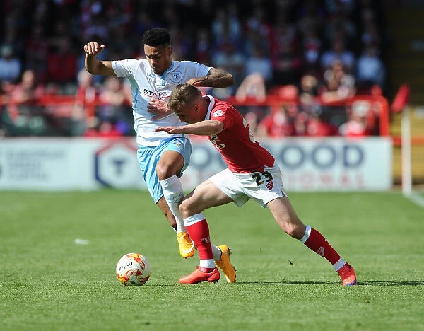 Battling for Supremacy: Bryans vs. Willis in the Intense Clash between Bristol City and Coventry City
