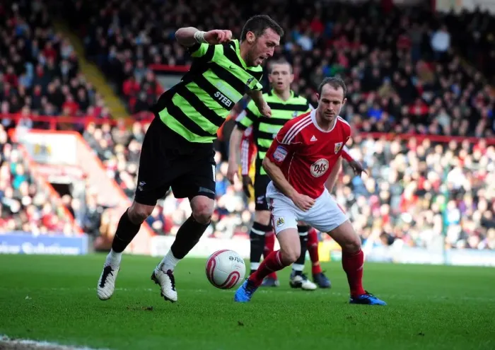 Framed Print : Battling for Supremacy: Carey vs. Miller in the Championship Clash between Bristol City and Scunthorpe United (February 2010) Framed Print : Battling for Supremacy: Carey vs. Miller in the Championship Clash between Bristol City and Scunthorpe United (February 2010)