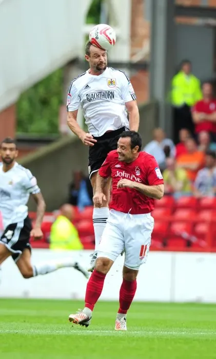 Framed Print : Battling for Supremacy: Carey vs. Reid in Nottingham Forest vs. Bristol City Championship Clash