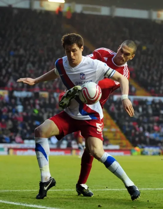 Framed Print : Battling for Supremacy: Caulker vs. McCarthy in the Championship Clash between Bristol City and Crystal Palace (December 2010)