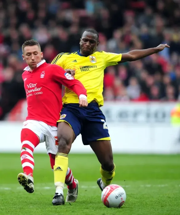 Framed Print : Battling for Supremacy: Cisse vs. Majewski in Nottingham Forest vs. Bristol City Clash
