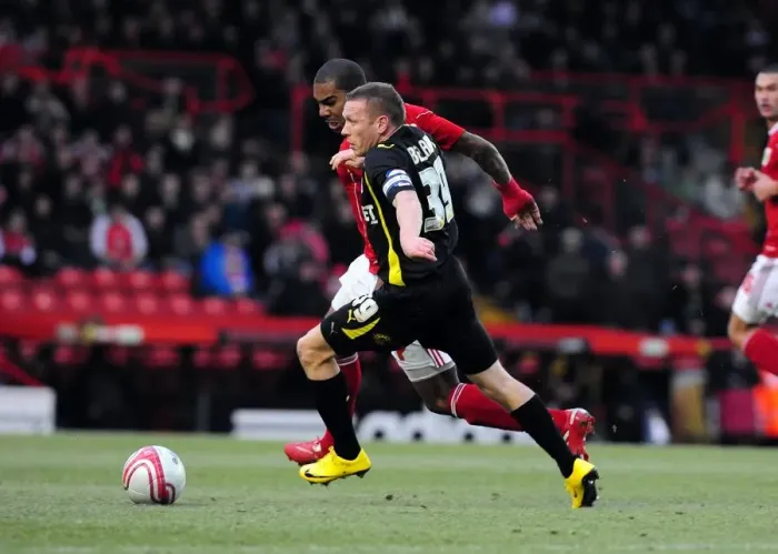 Framed Print : Battling for Supremacy: Craig Bellamy vs. Marvin Elliott in the 2011 Championship Clash between Bristol City and Cardiff City