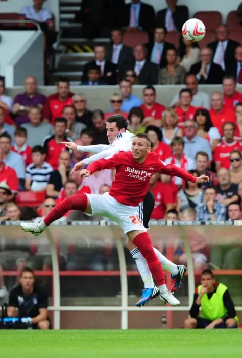 Framed Print : Battling for Supremacy: Cunningham vs. Majewski in Nottingham Forest vs. Bristol City Championship Clash Framed Print : Battling for Supremacy: Cunningham vs. Majewski in Nottingham Forest vs. Bristol City Championship Clash