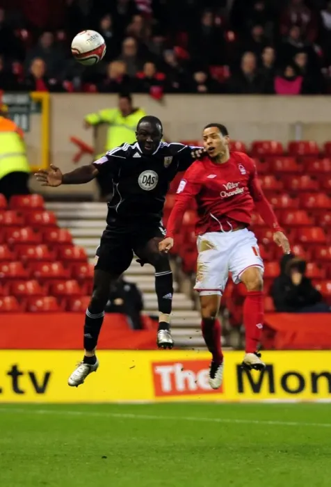 Framed Print : Battling for Supremacy: Damion Stewart vs. David McGoldrick in Forest v Bristol City Football Match, 2011