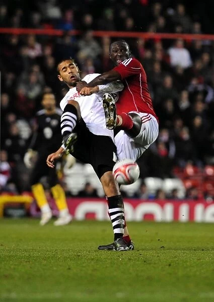 Battling for Supremacy: Damion Stewart vs. Luke Moore in the 2011 Championship Clash between Bristol City and Swansea City
