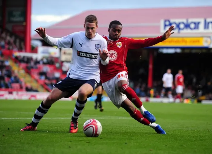 Framed Print : Battling for Supremacy: Danny Rose vs. Paul Coutts in the Championship Clash between Bristol City and Preston North End