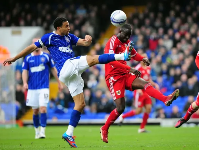 Framed Print : Battling for Supremacy: Edwards vs. Adomah in Ipswich Town vs. Bristol City Football Match, March 2012 Framed Print : Battling for Supremacy: Edwards vs. Adomah in Ipswich Town vs. Bristol City Football Match, March 2012